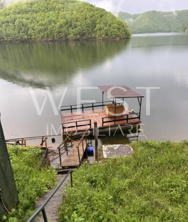 Cabana de vacanta cu front la lac + Ponton electric/ Teren 1000mp /Tarnita
